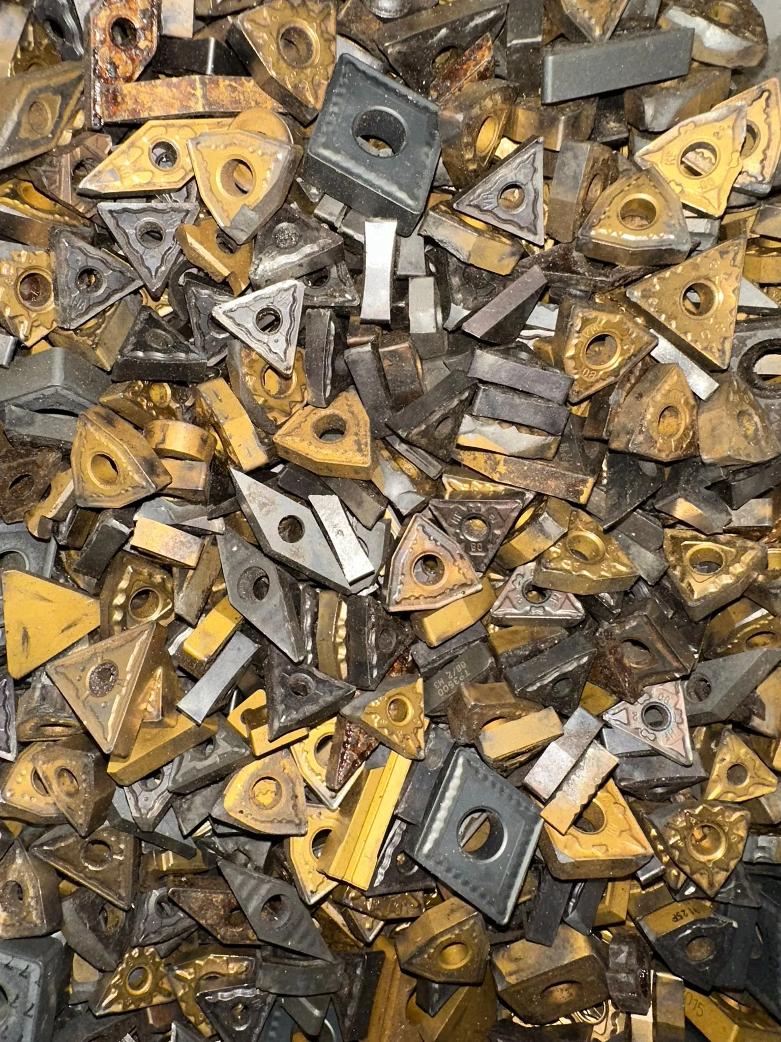 Used indexable carbide inserts collected for recycling