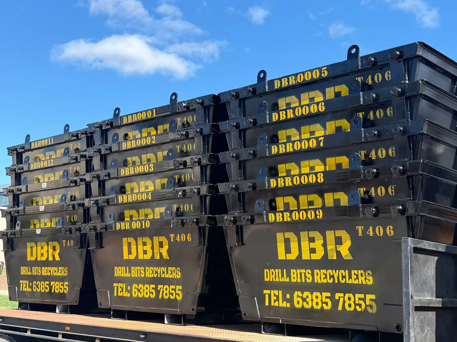 Drill Bits Recyclers bins stacked on a trailer ready for delivery